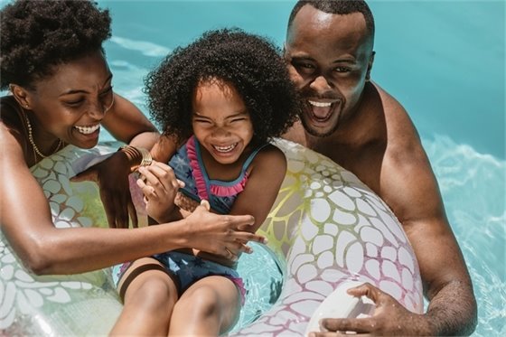 Family Swimming in Pool