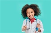 young girl in doctor lab coat
