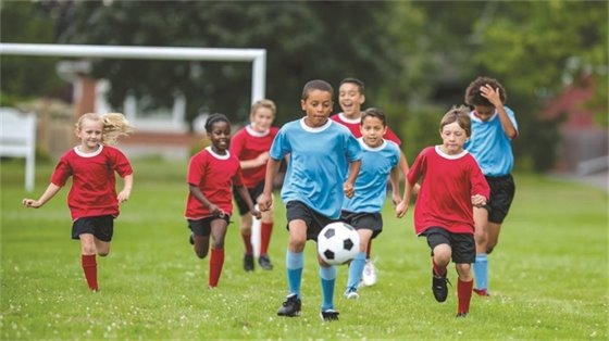 Kids playing soccer