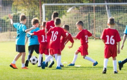 Kids playing soccer