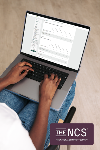 Someone taking a survey on a laptop